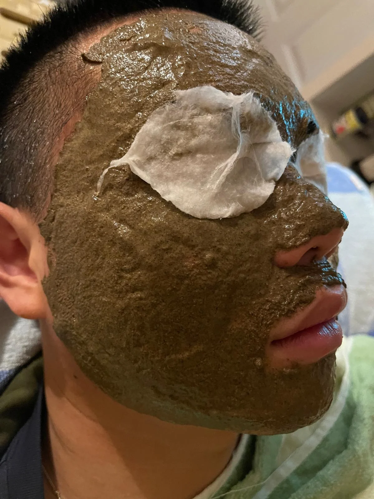 A detailed profile view of a herbal facial treatment